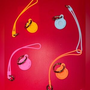Set of 4 silicone apple air tag holders NEW